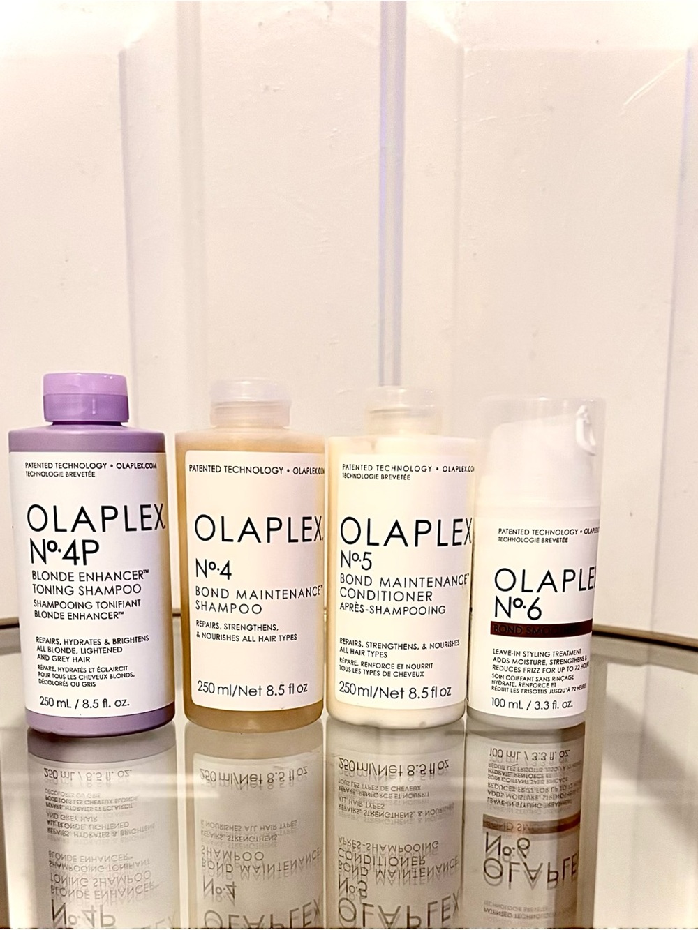 OLAPLEX Bond Repair & Blonde Enhancer Set in Purple, Clear, Ivory, White